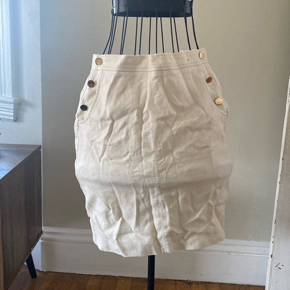 Cream colored gold button skirt